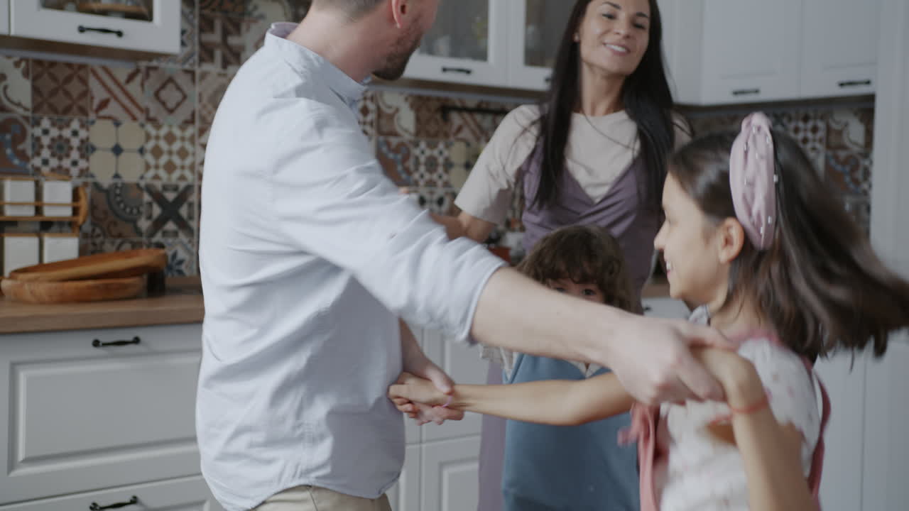 Family Dancing in the Kitchen