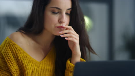 Boring-business-woman-looking-computer-screen.-Tired-woman-reading-documents