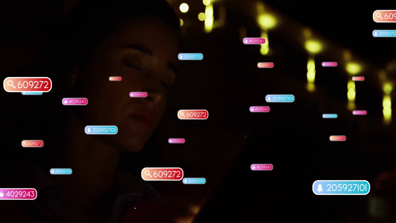 Looking at colorful digital animation, person in dark environment focusing intently