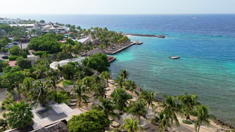 aerial establishing view of clear turquoise caribbean waters by jan thiel and zanzibar beach, curacao