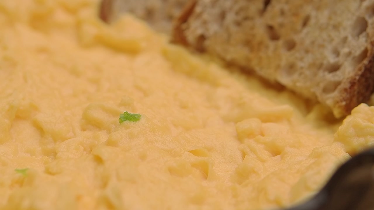 Creamy Scrambled Eggs with Fresh Chives and Toast