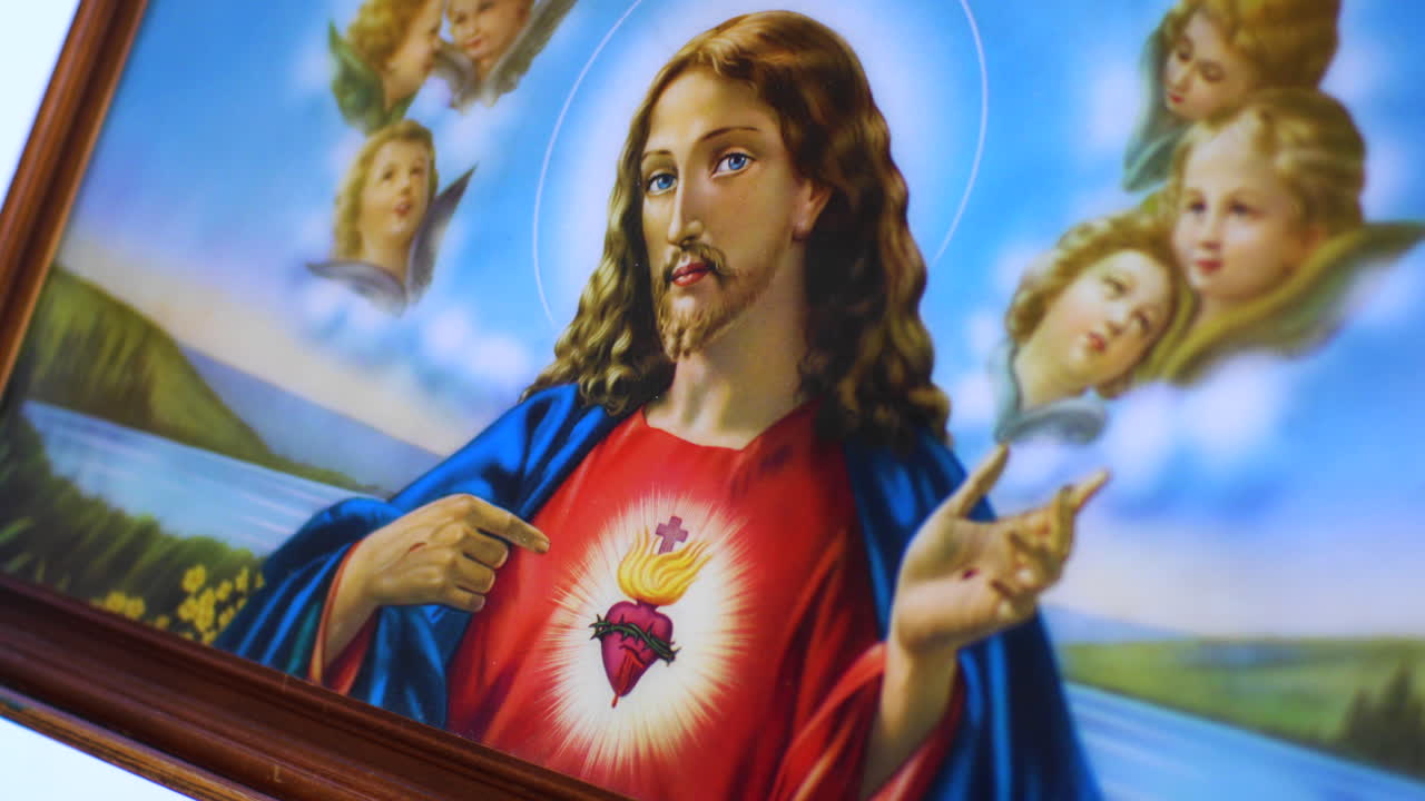 Jesus Christ, sacred heart, painting, framed  tracking from left to right in 4K