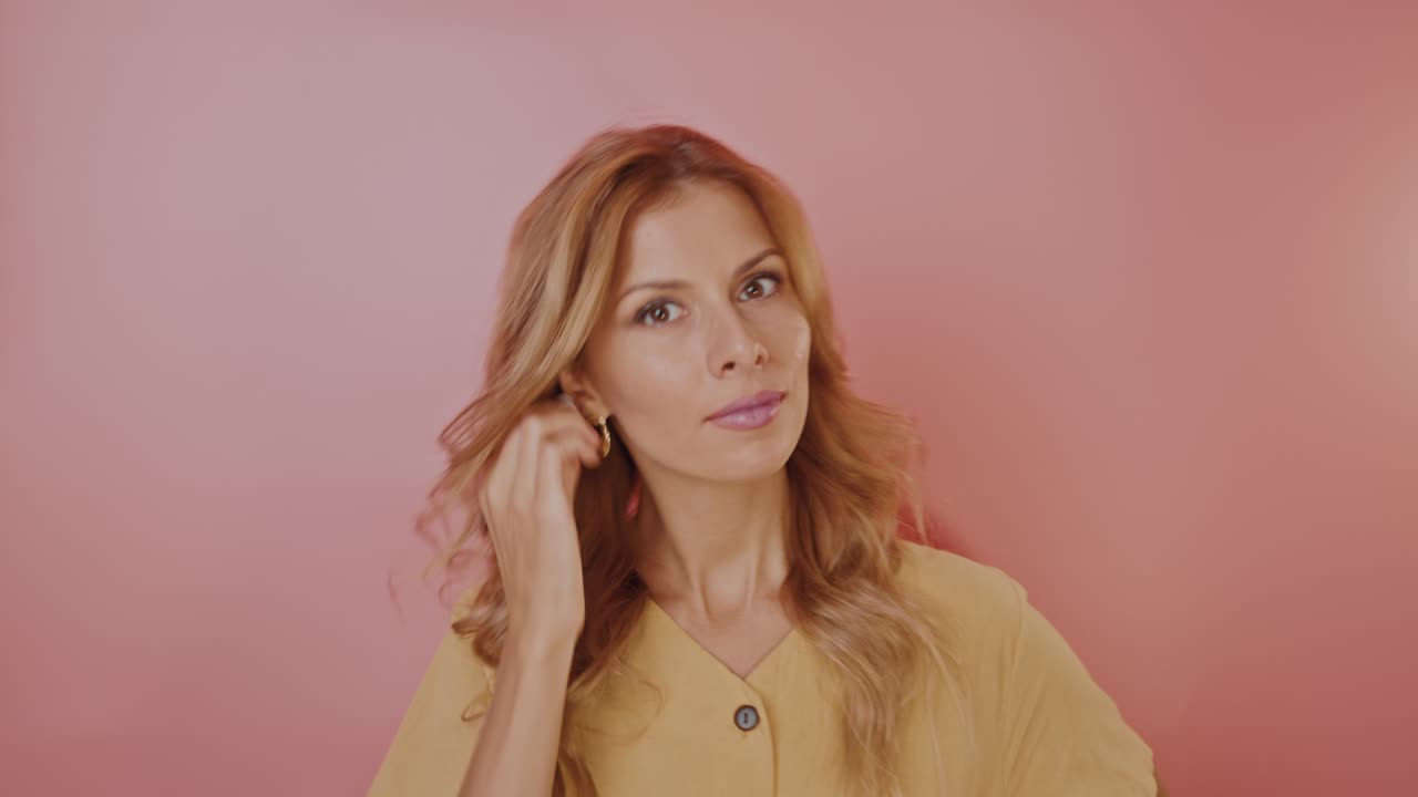 Woman with Wireless Headphones in a Studio Portrait