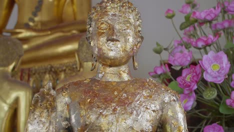 buddha decorated with gold leaf