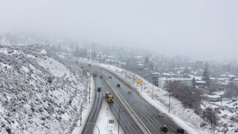 the icy divide: semi trucks moving down highways 1 and 5 in kamloops