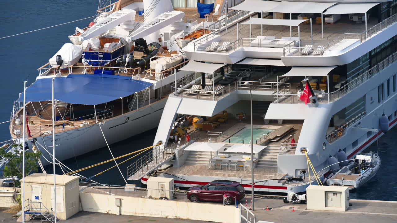 View of white yacht docked in the Monaco Marina