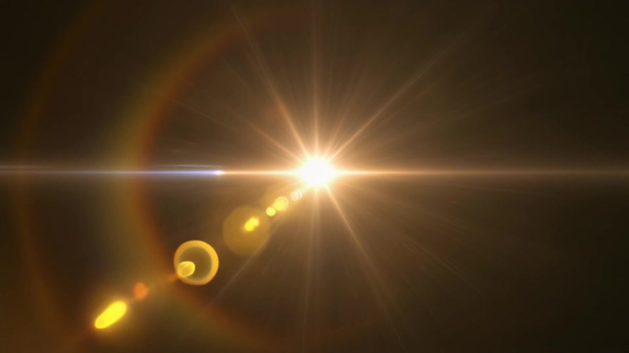Effetto Golden Lens Flare su sfondo nero