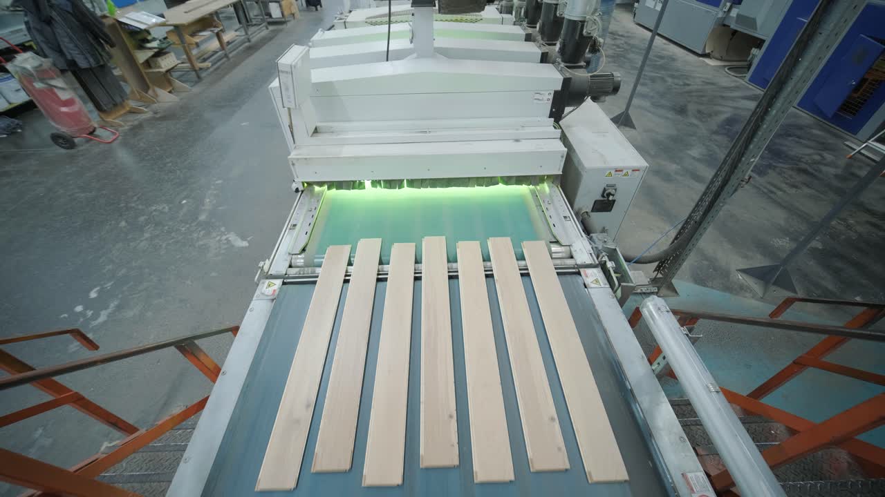 Wooden Planks Moving on Conveyor Belt in Factory