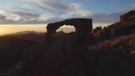 aerial view travelling in to the nublo window during sunset