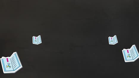 animación de los iconos de los libros escolares y el espacio de copia sobre fondo negro