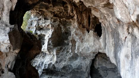 natural cave rock formation, asian karst mountain cave interior stalactites