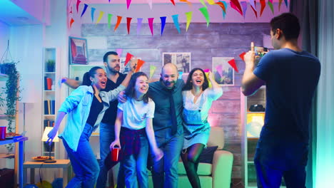 cheerful group of people smiling at the party