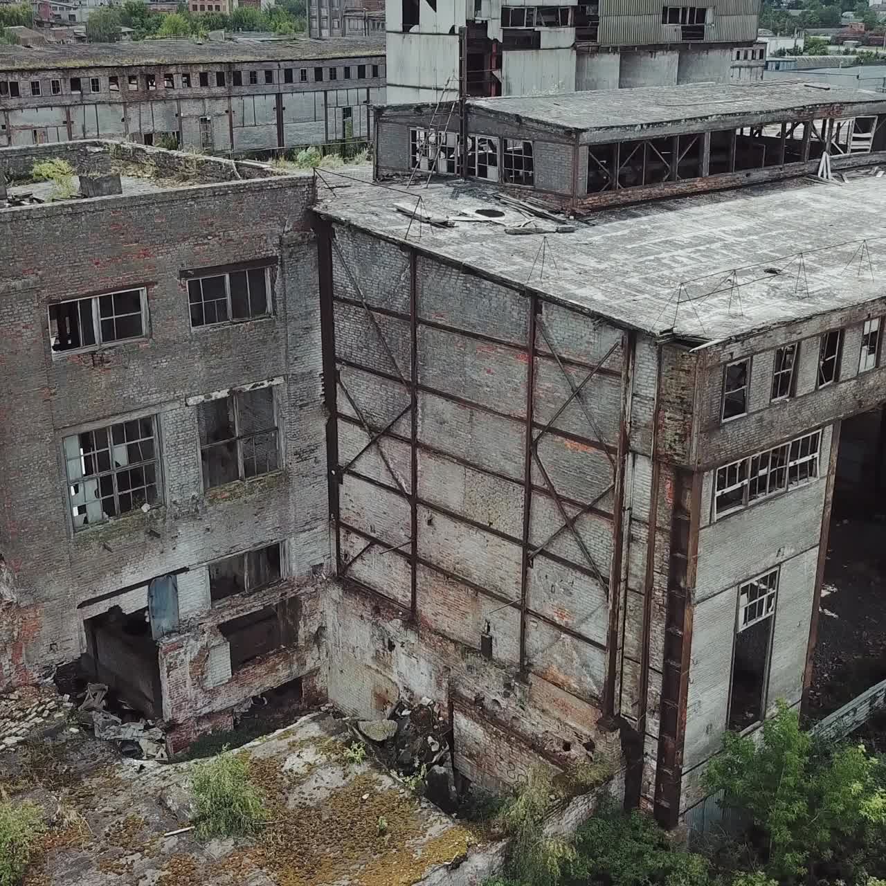 Ruins of an old factory. Old industrial building for demolition. Aerial view
