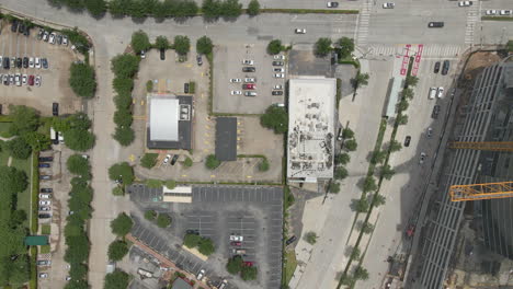 Aerial-view-of-crane-and-building-under-construction-in-downtown,-Houston,-Texas