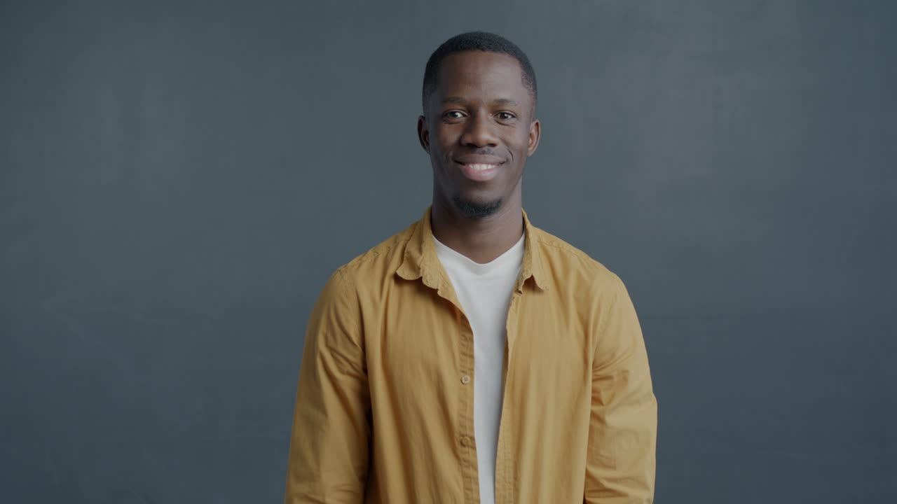 Happy Man Holding a Gift