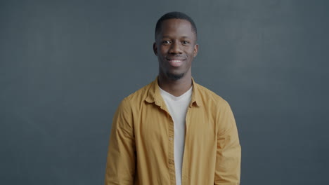 happy man holding a gift
