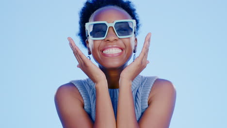 black woman, sunglasses and face in studio