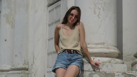 young woman posing outdoors