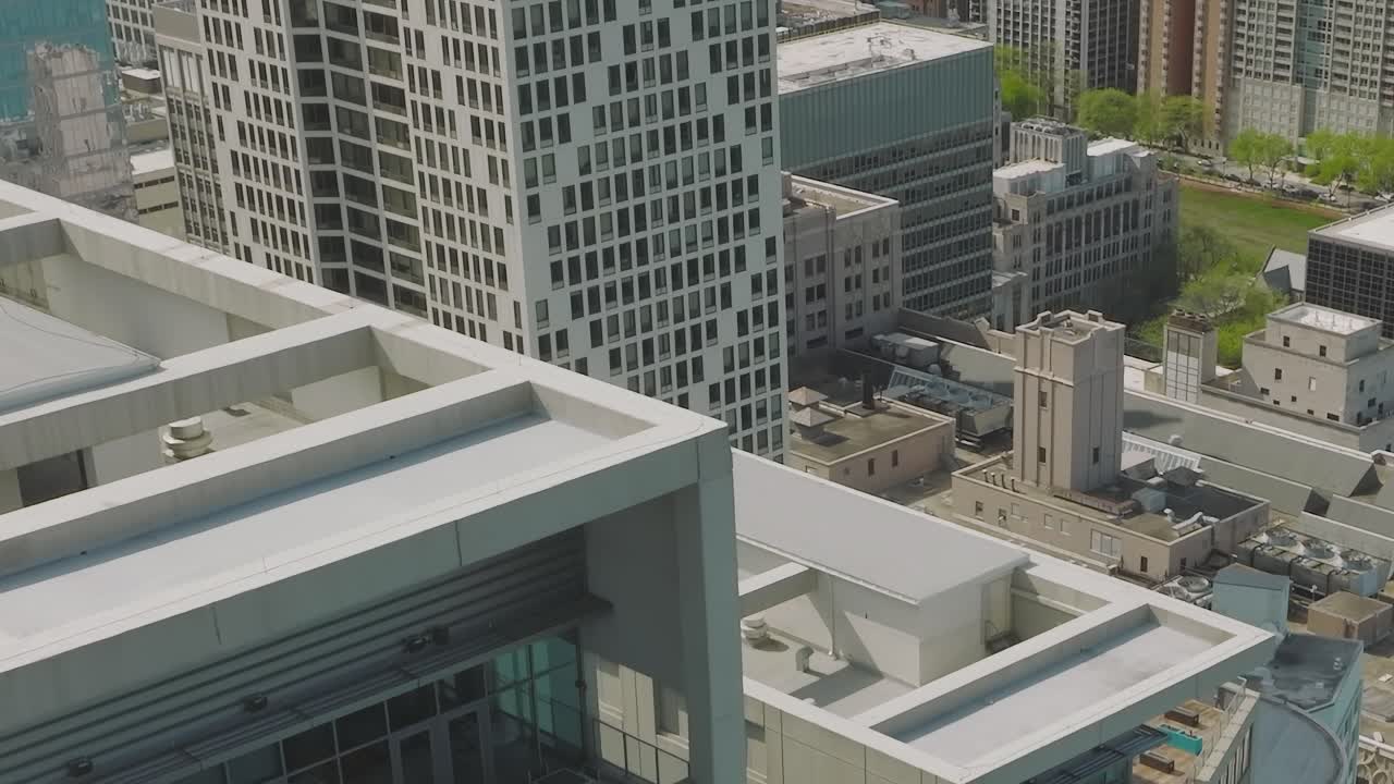 Aerial view of modern buildings in Chicago with rooftop amenities