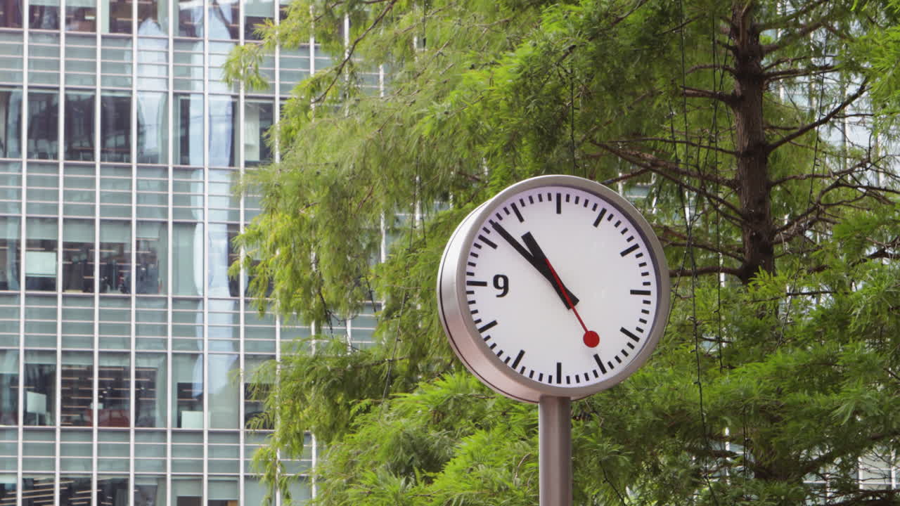 Close Up Shot Of The Iconic Outdoor Clock At Canary Wharf In London, England, United Kingdom