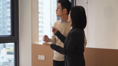 a real estate agent showing house for the client