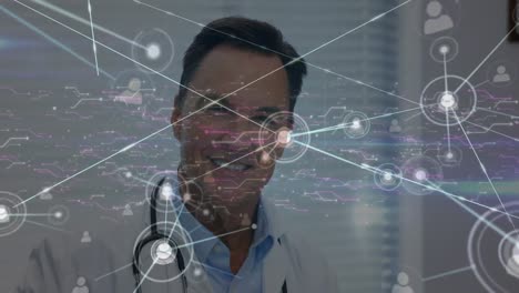 Animation-of-network-of-connections-over-caucasian-male-doctor-smiling