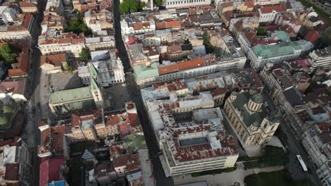 aerial drone view of historical bosnian city planning scheme, view of houses roofs and streets