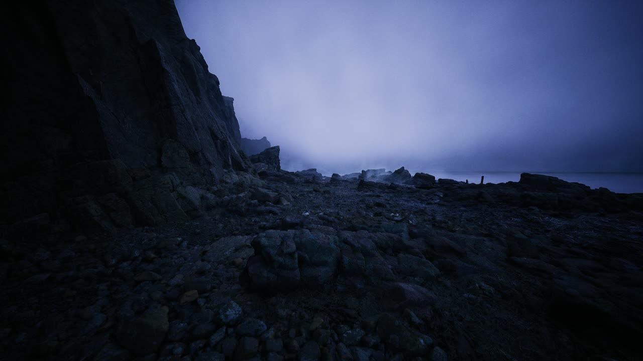 Dramatic overcast sky enhances isolated coastal geological setting
