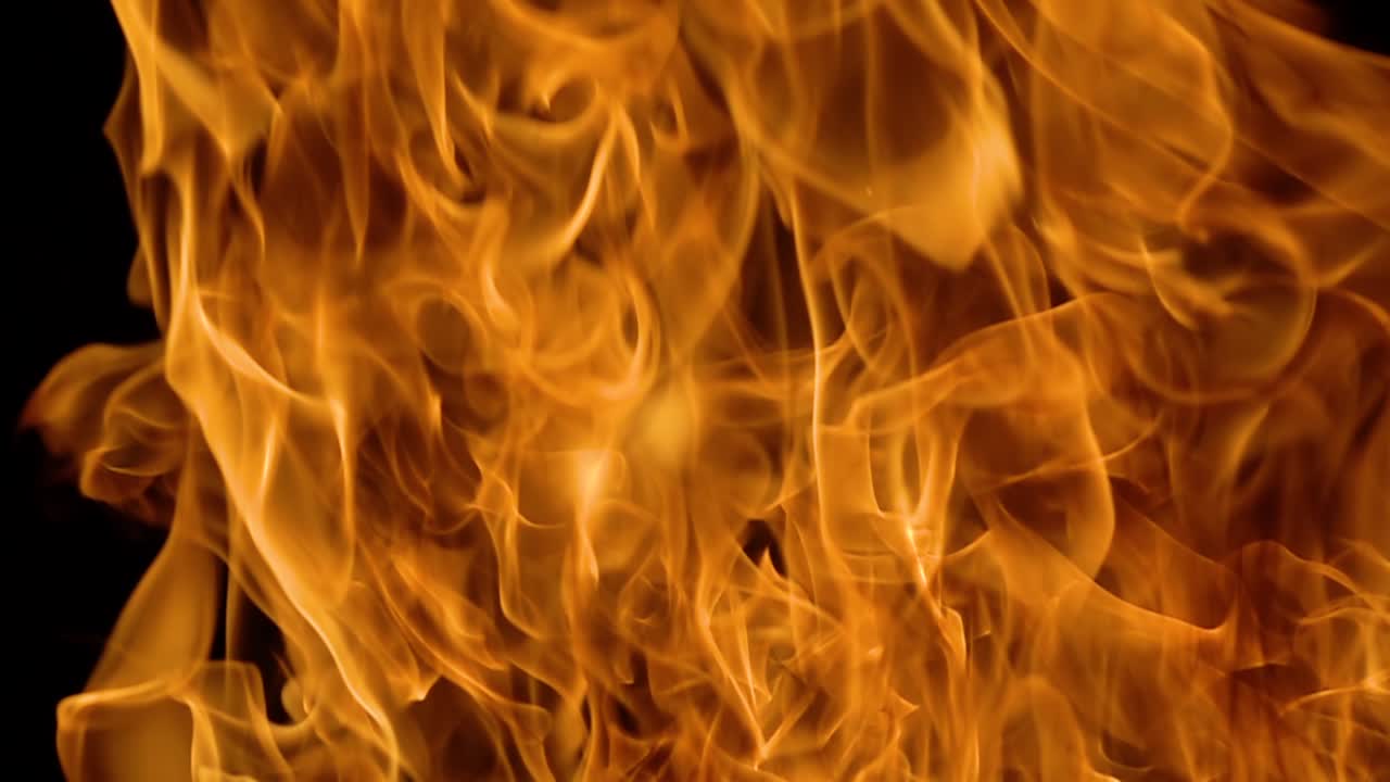Flames of fire on black background in slow motion