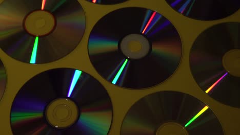 vintage cd or dvd disk background, old circle discs used for data storage, share movies and music