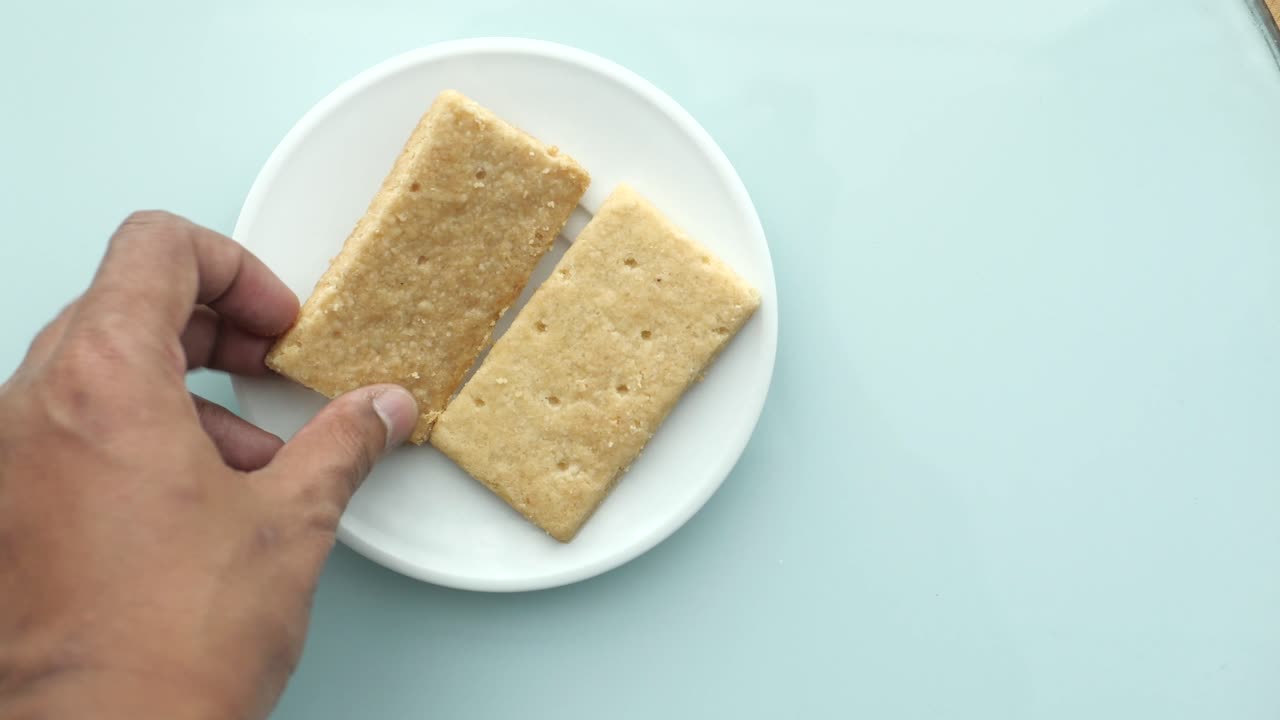 Two Biscuits on a Plate