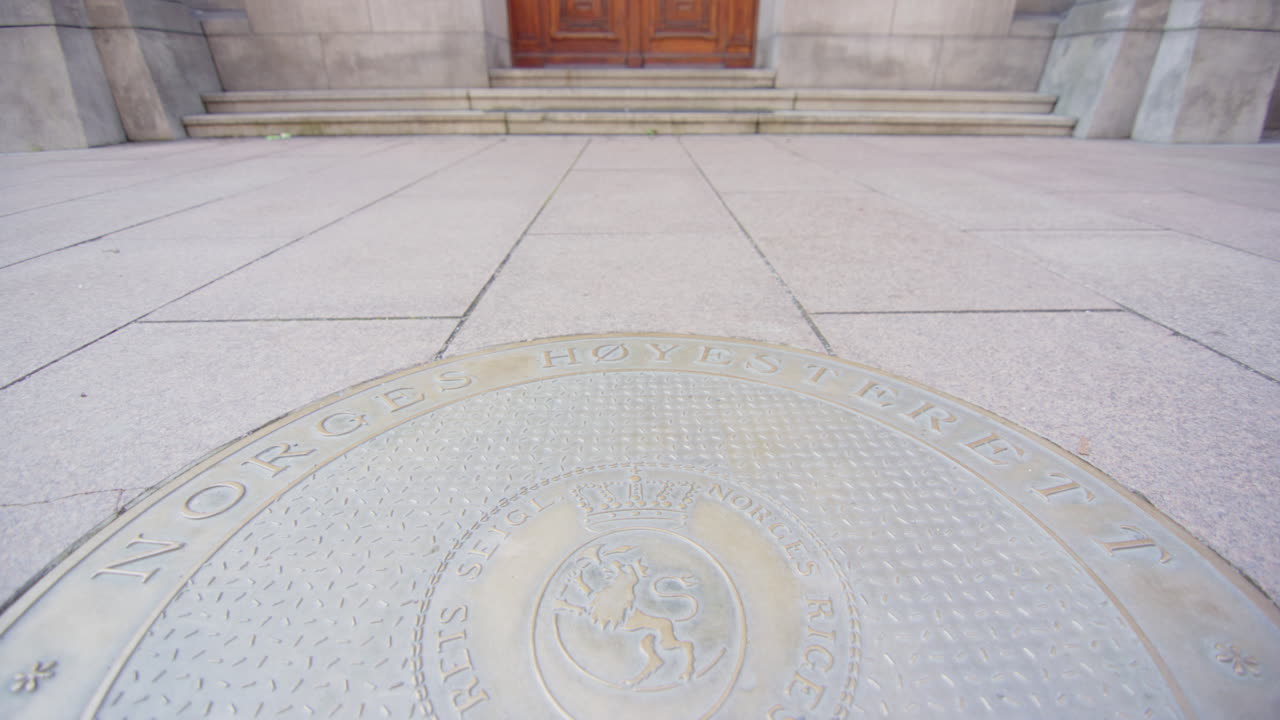 Coat of arms at entrance to building of Oslo Supreme Court in Norway, closeup