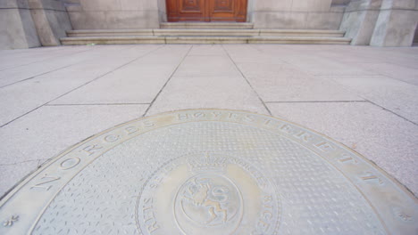 coat of arms at entrance to building of oslo supreme court in norway, closeup