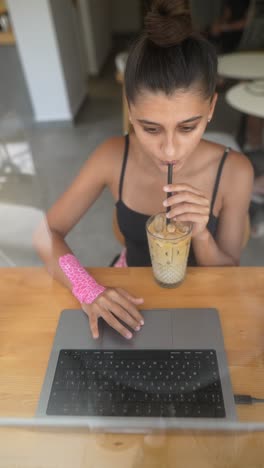 young woman working at a cafe