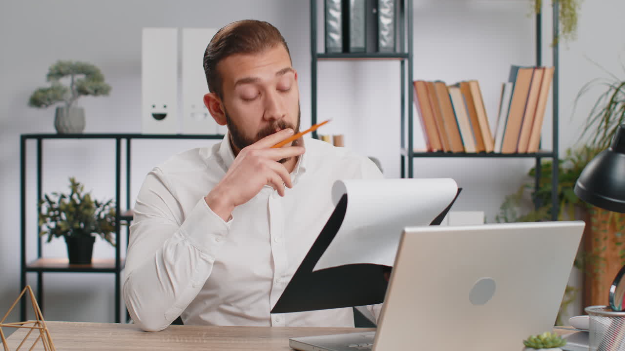 Business man reading business contract planning project analyzing resume good paperwork results