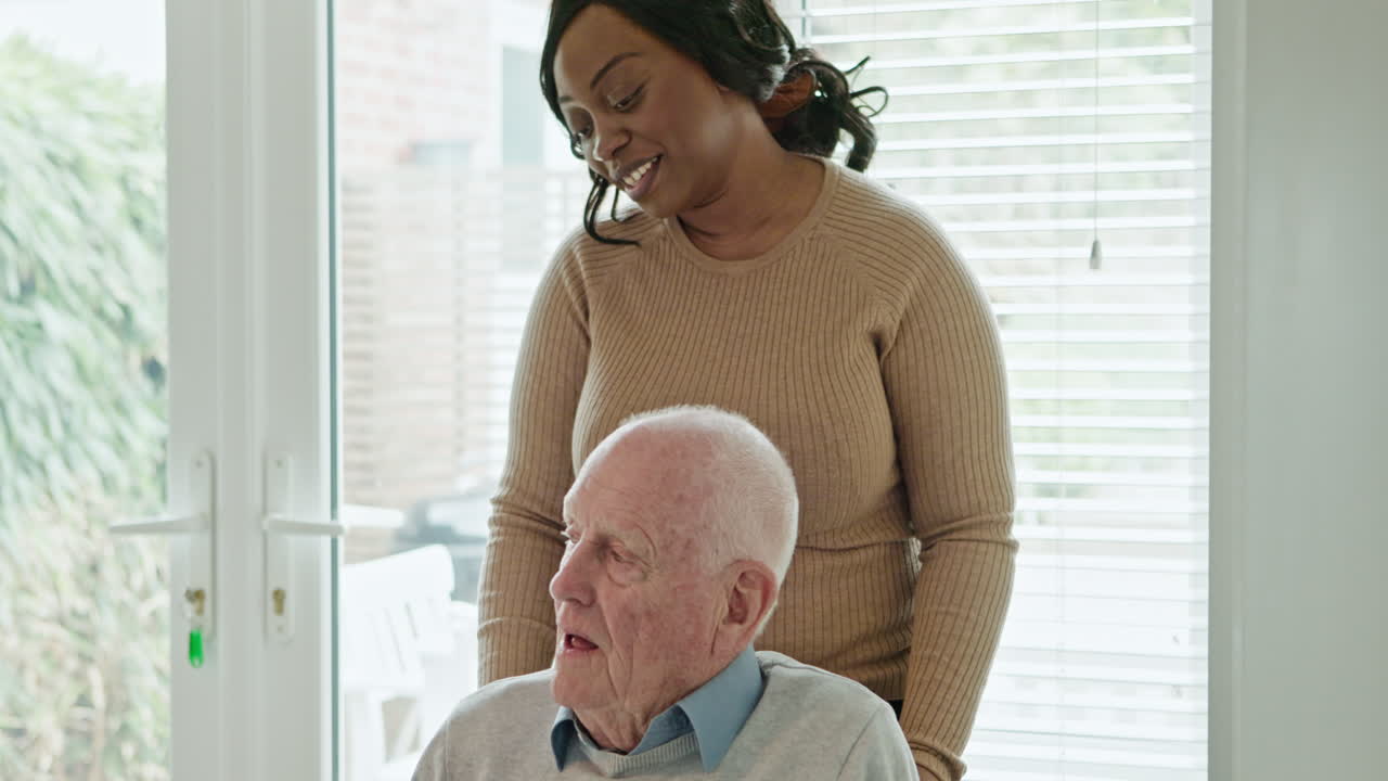 Elderly man with caregiver