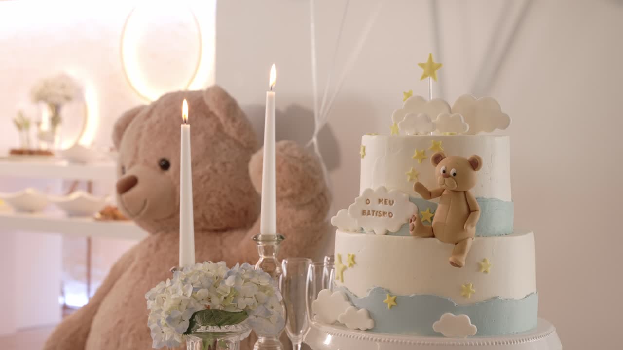 cute teddy bear cake for baptism celebration with clouds stars and candles