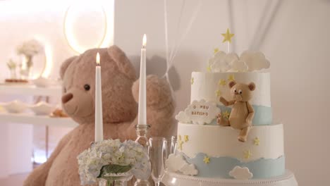 cute teddy bear cake for baptism celebration with clouds stars and candles