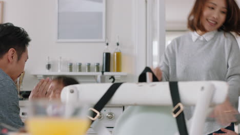 happy-asian-family-dancing-in-kitchen-children-having-fun-dance-with-mother-and-father-enjoying-exciting-weekend-at-home-4k-footage