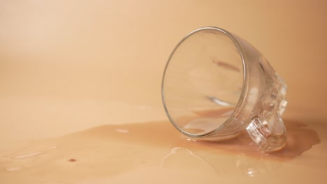 spilled coffee from glass cup