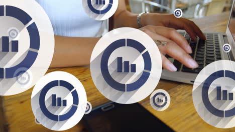 animation of graph icon in circles over midsection of caucasian woman working on laptop