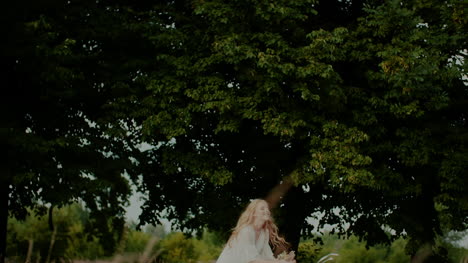 Young-Carefree-Woman-Tosses-Bouquet-Up