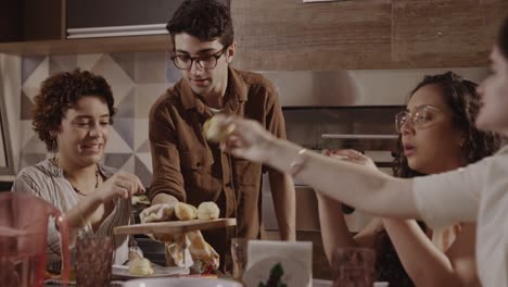 friends sharing a meal and enjoying each other's company at home