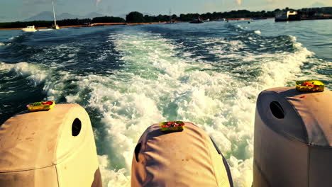 speeding boat scene at manta point, vibrant ocean adventure feeling