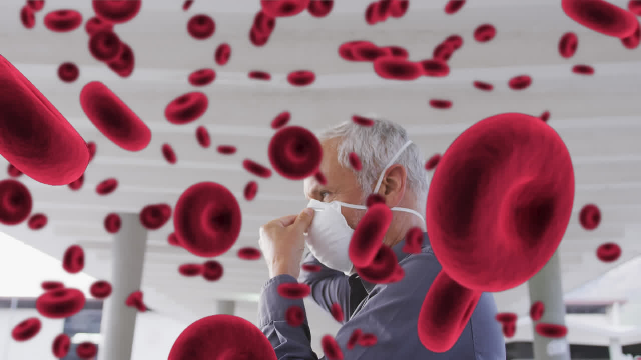 도시 거리에서 얼굴 마스크를 쓰고 있는 남자 위에 떠다니는 적혈구의 애니메이션