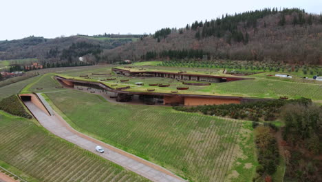 establishing shot of beautiful winery in tuscany