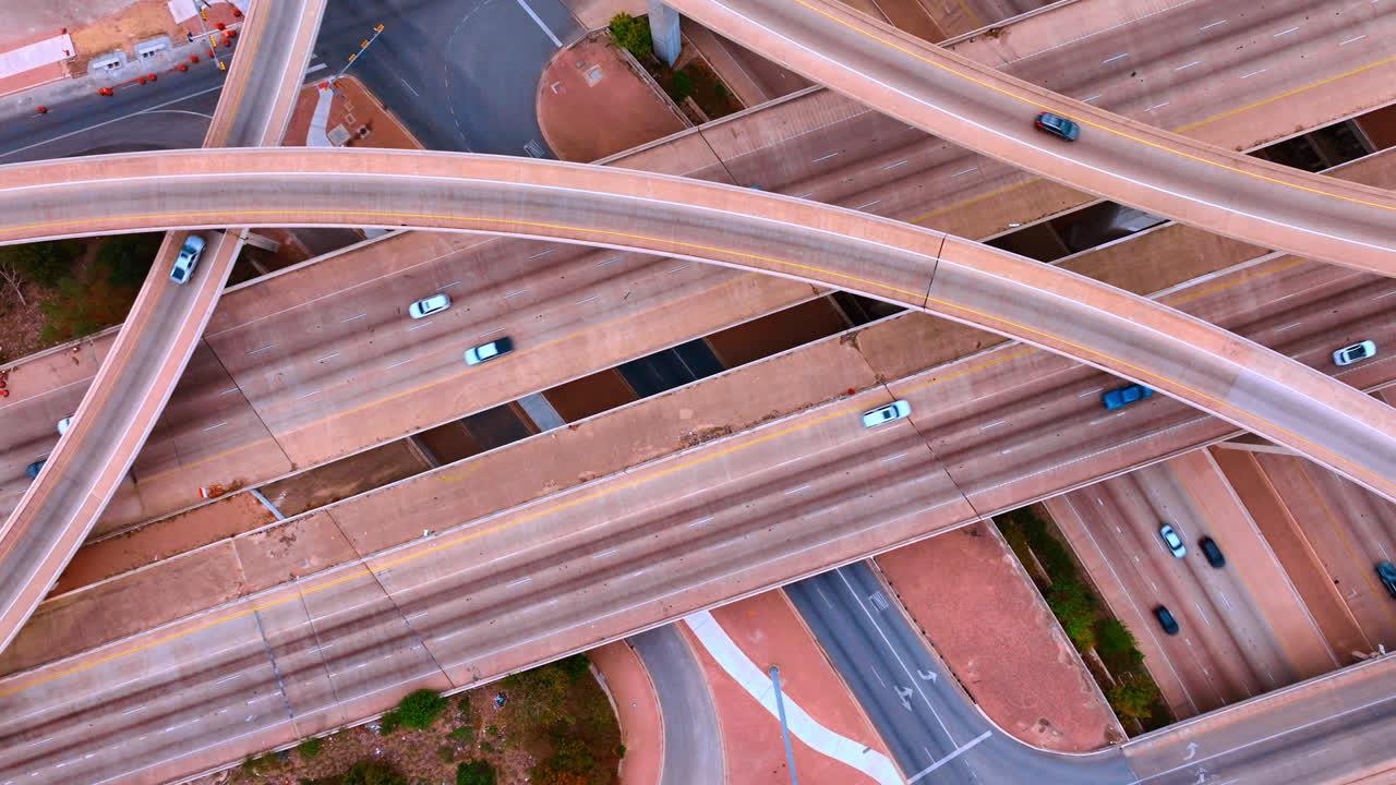 Rising over the busy interchange at daytime. Commuting in the modern city