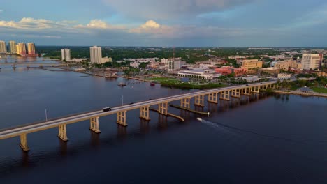large bridge over river leading to fort myers city in florida, aerial establisher