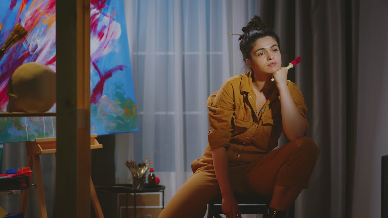 Successful woman in art studio