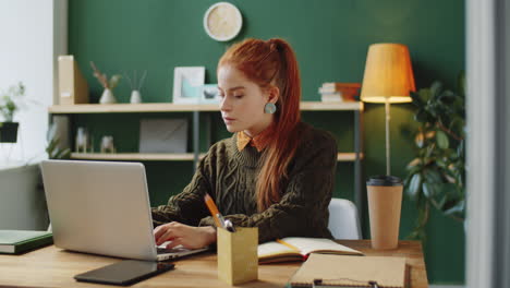 young woman working from home